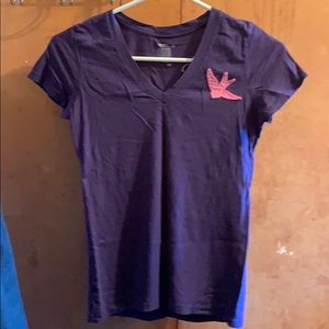 Cute purple v-neck t-shirt with pink dove accent